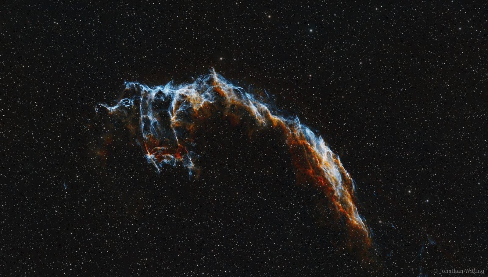 The Eastern Veil Nebula (NGC 6992), the brightest arc of the Cygnus Loop supernova remnant.